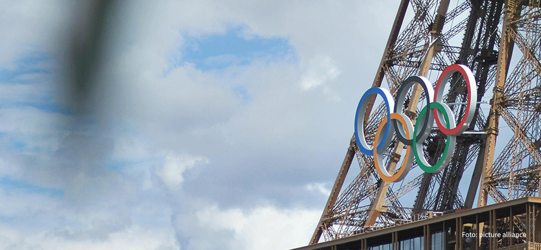 Foto: Eiffeltum mit den olympischen Ringen, Foto: picture alliance