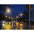 Foto vom 4. Januar 2012: regennasse Fahrbahn im Licht der Straßenlampen